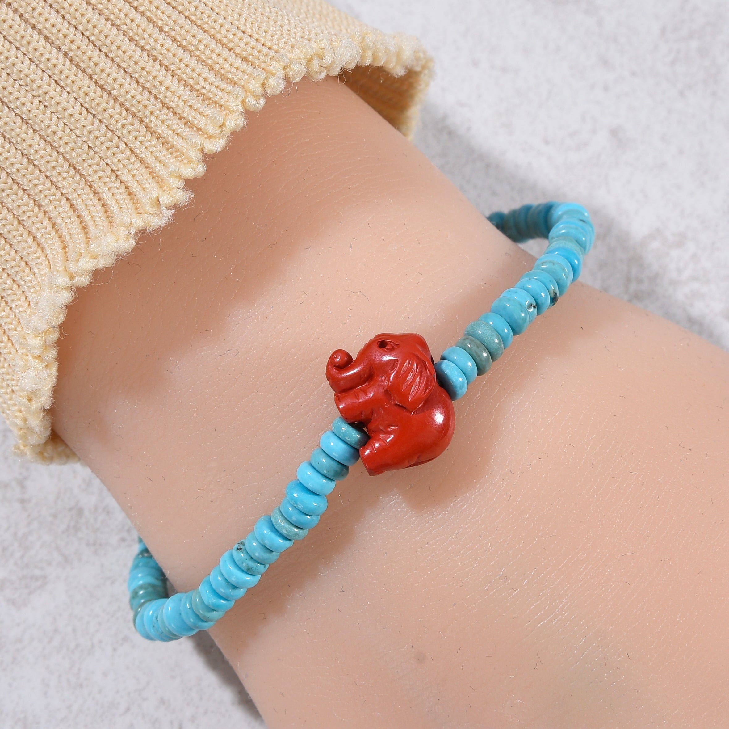 Kalifano Gemstone Bracelets Howlite Turquoise 2x4mm Elastic Gemstone Bracelet with Cinnabar Elephant