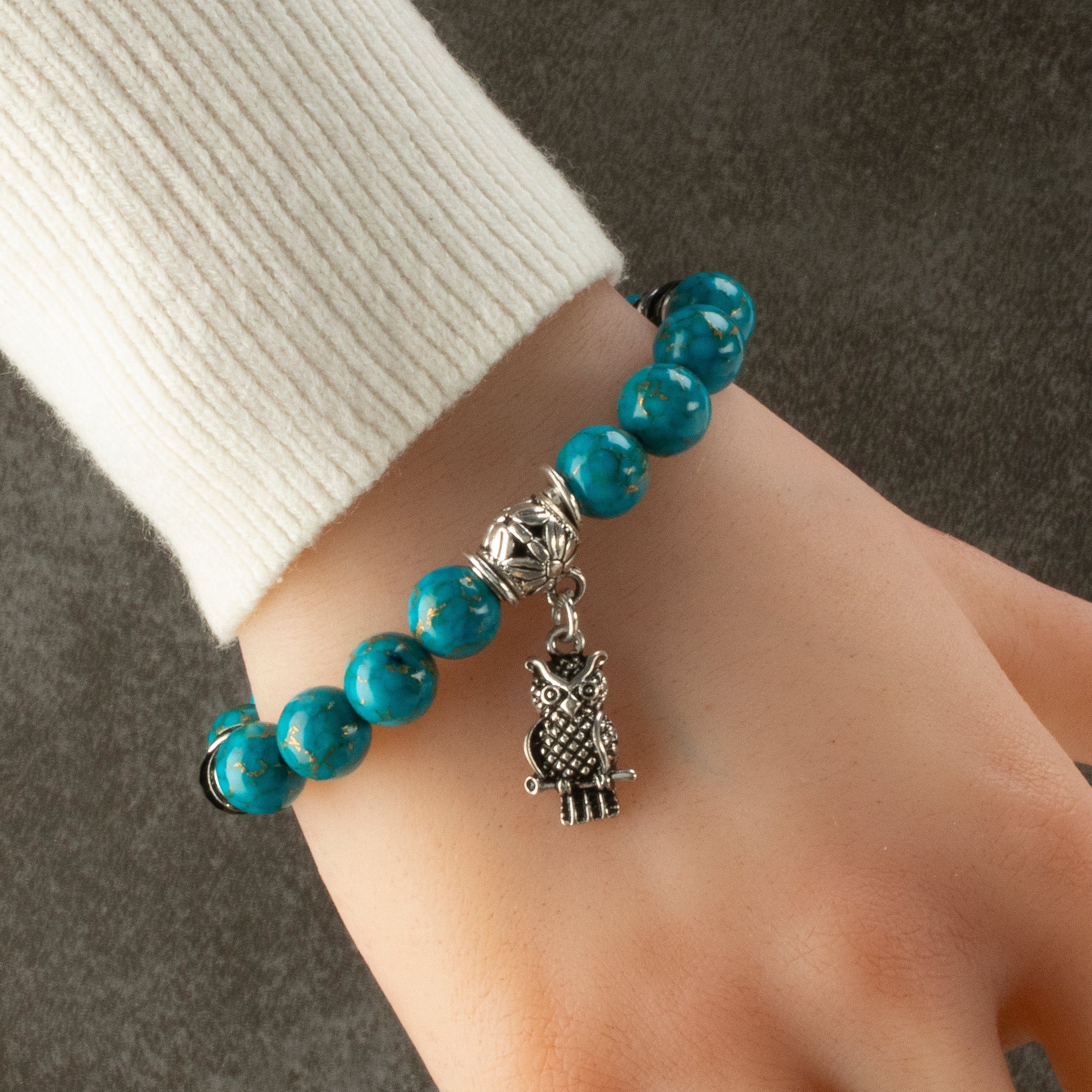 Kalifano Gemstone Bracelets Turquoise 10mm Gemstone Elastic Bead Bracelet with Owl Accent Bead RED-BGP-073