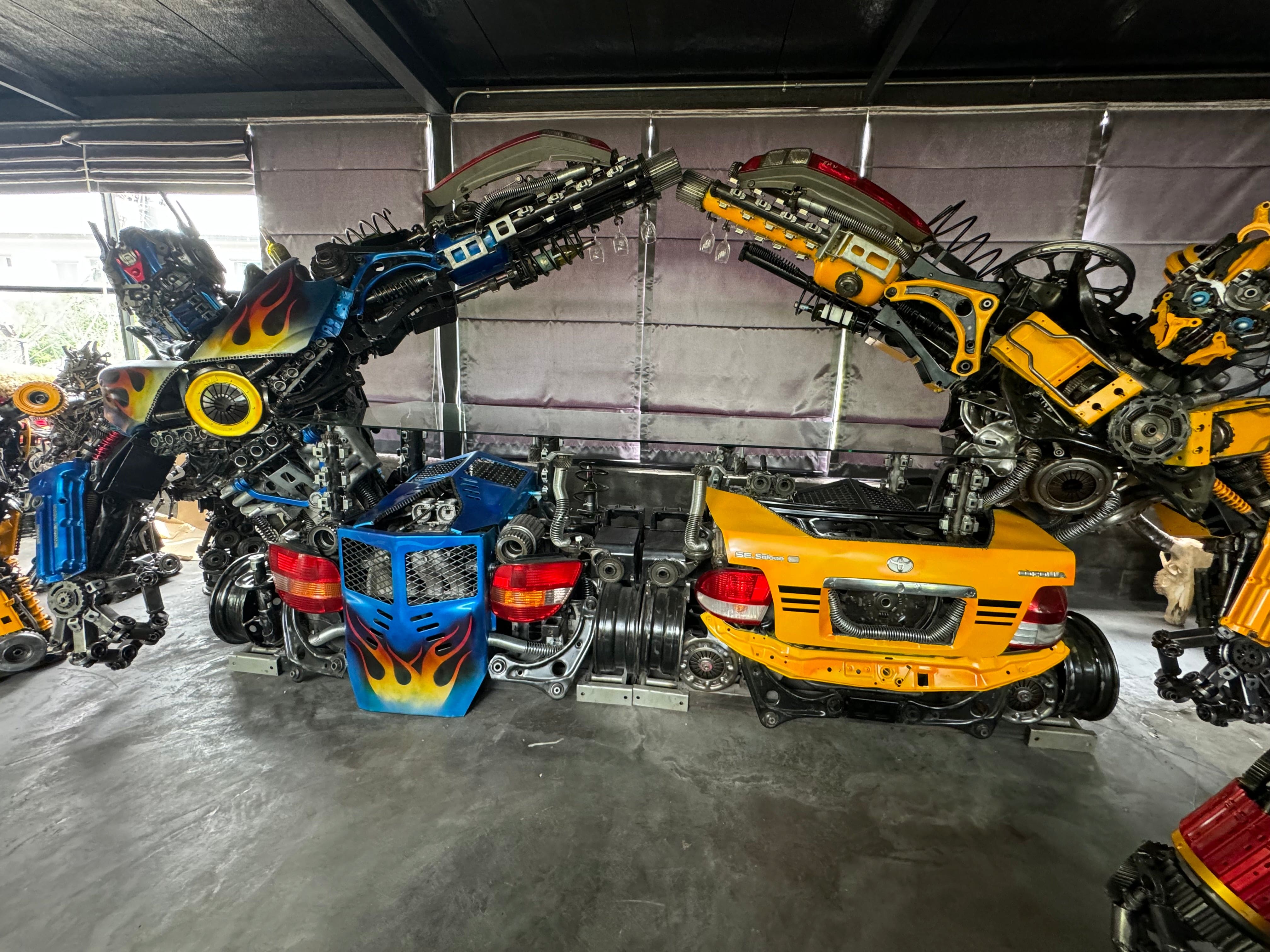 Kalifano Recycled Metal Art Bumblebee & Optimus Prime Inspired Bar Table Recycled Metal Art Sculpture RMS-BAROPBB-S