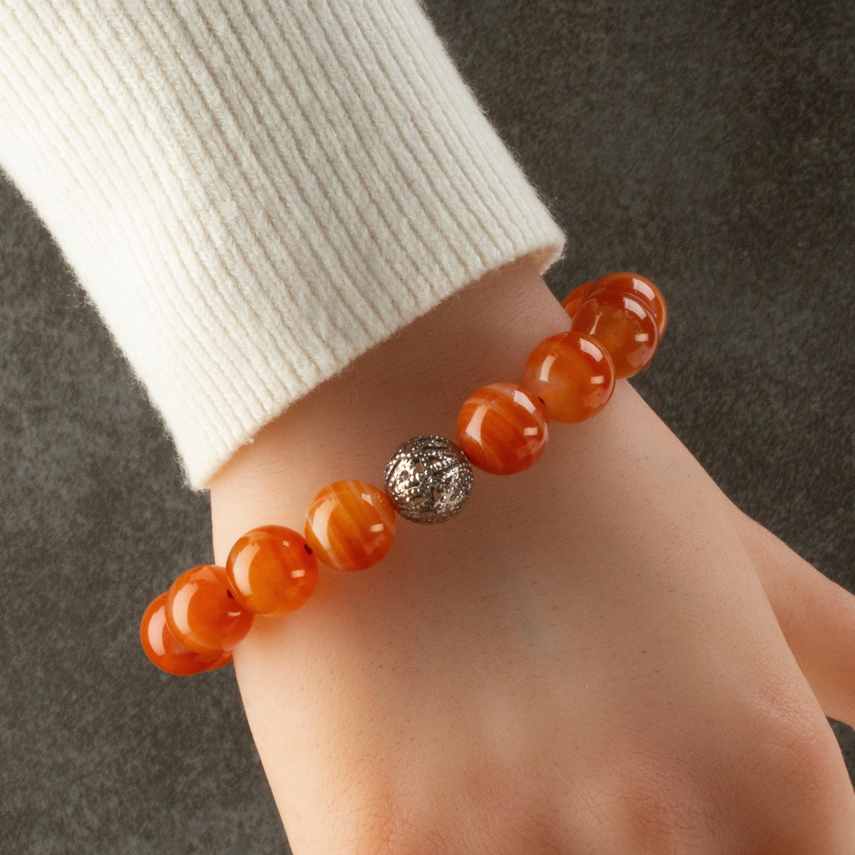 Kalifano Gemstone Bracelets Polished Banded Carnelian 12mm Gemstone Bead Elastic Bracelet with Silver Accent Bead GOLD-BGP-072