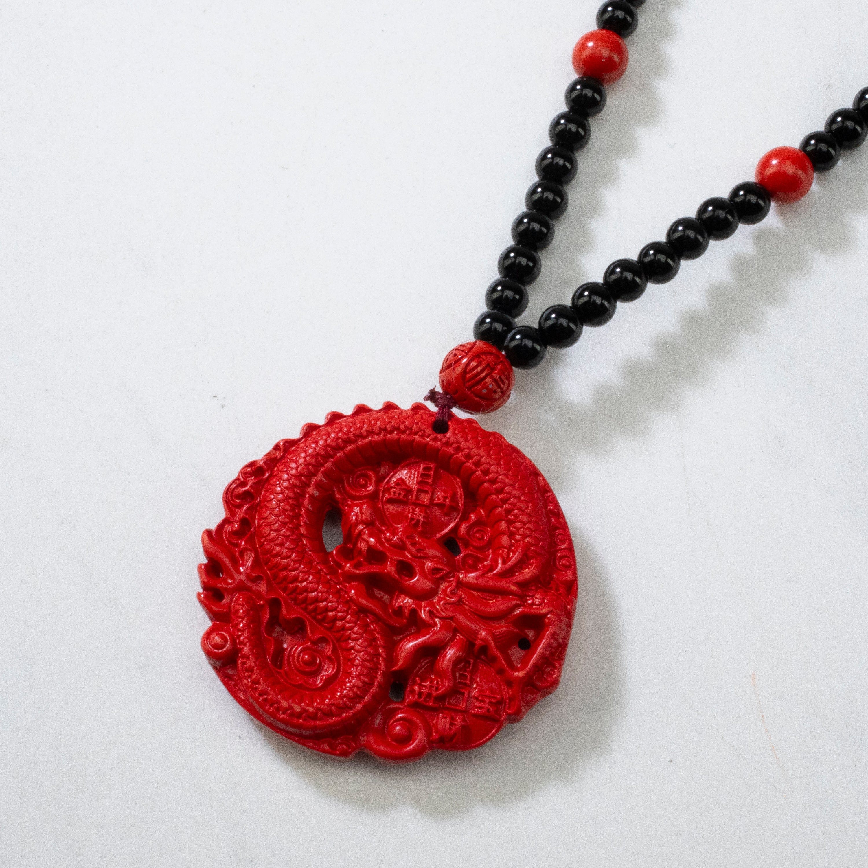 KALIFANO Gemstone Carvings Cinnabar Carving Dragon Amulet Necklace CBAR23B