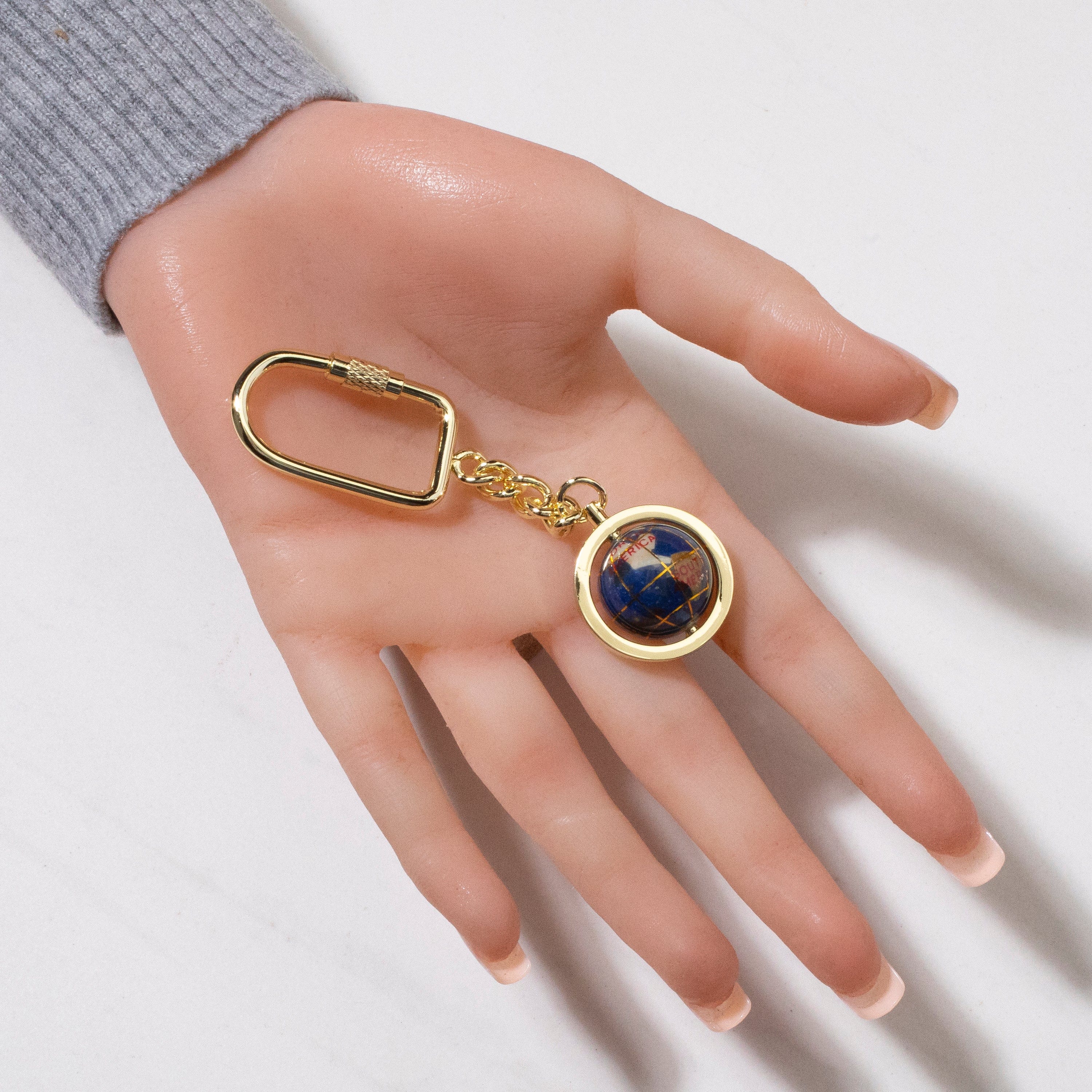 Kalifano Gemstone Globes Gemstone Globe with Lapis Ocean showcased on a Gold Colored Keychain LKCG-LP