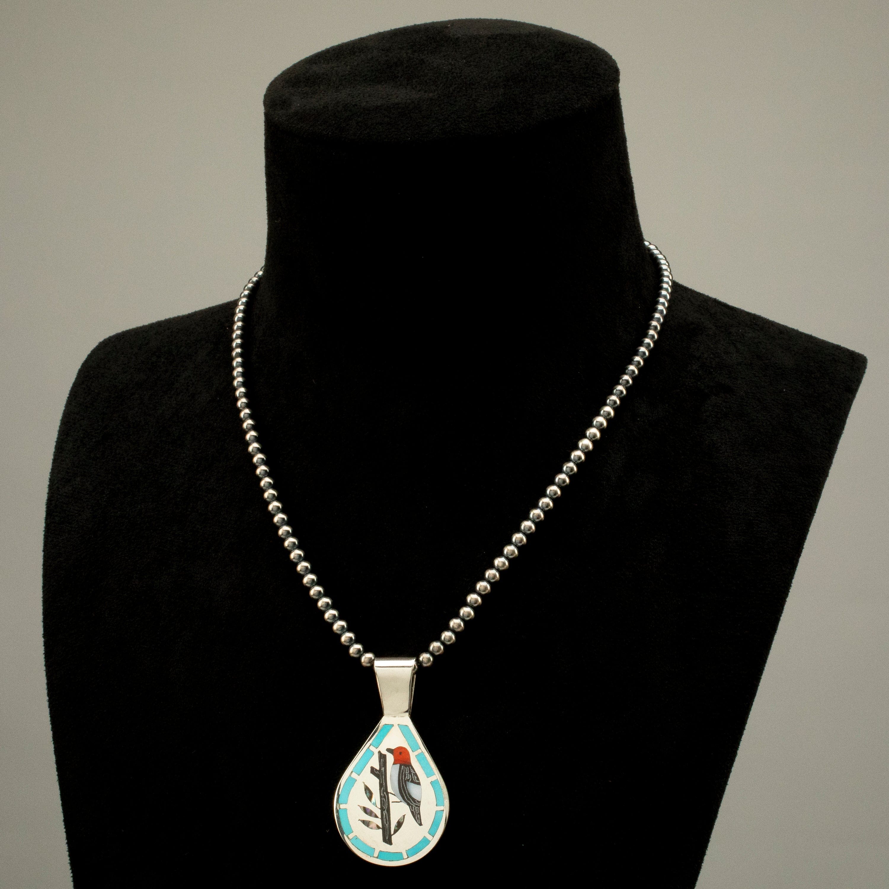 Kalifano Native American Jewelry 18" Dennis & Nancy Edaakie Mutli Gem Woodpecker Zuni Inlay Pendant with 4mm Navajo Pearl Necklace USA Native American Made 925 Sterling Silver NAN1500.015