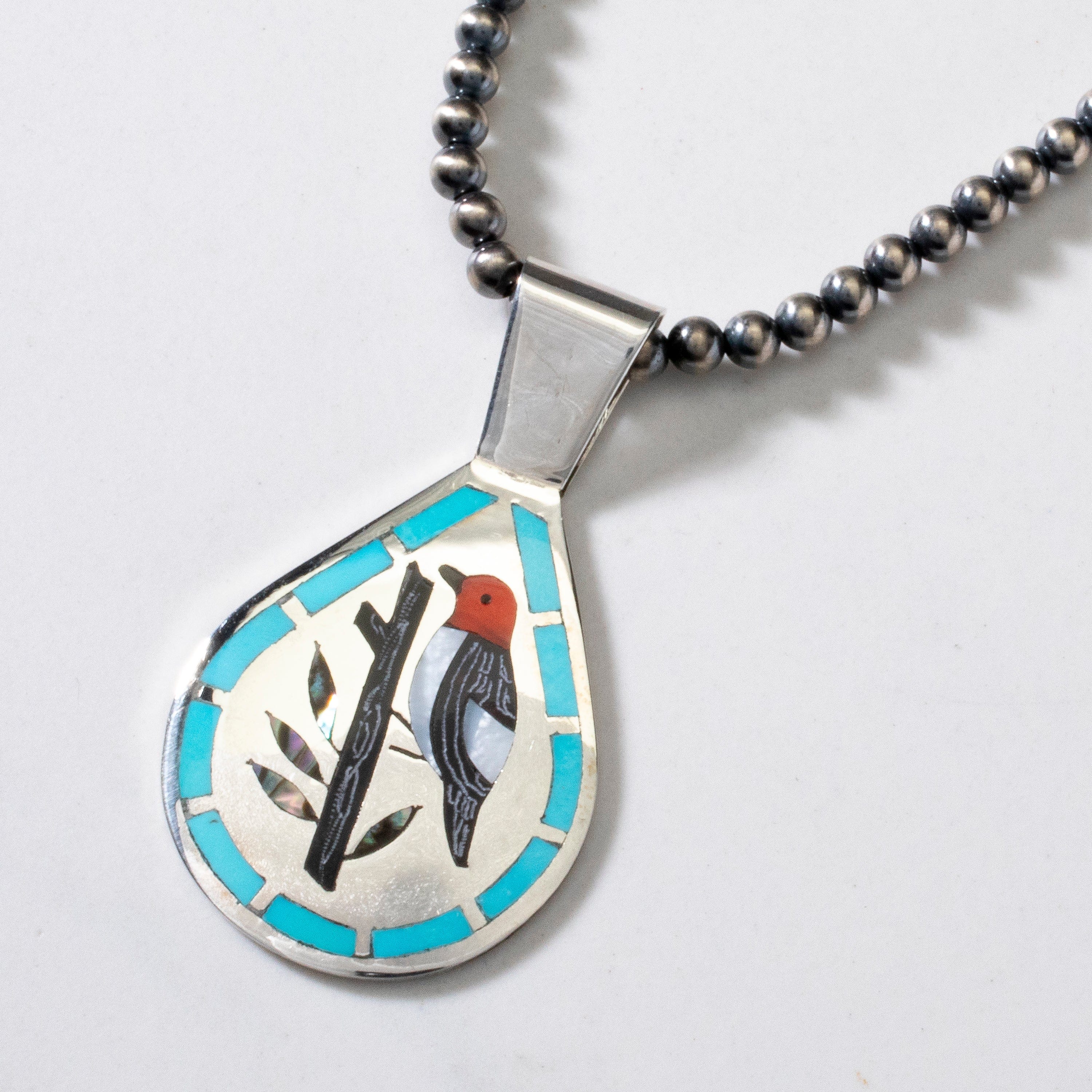 Kalifano Native American Jewelry 18" Dennis & Nancy Edaakie Mutli Gem Woodpecker Zuni Inlay Pendant with 4mm Navajo Pearl Necklace USA Native American Made 925 Sterling Silver NAN1500.015