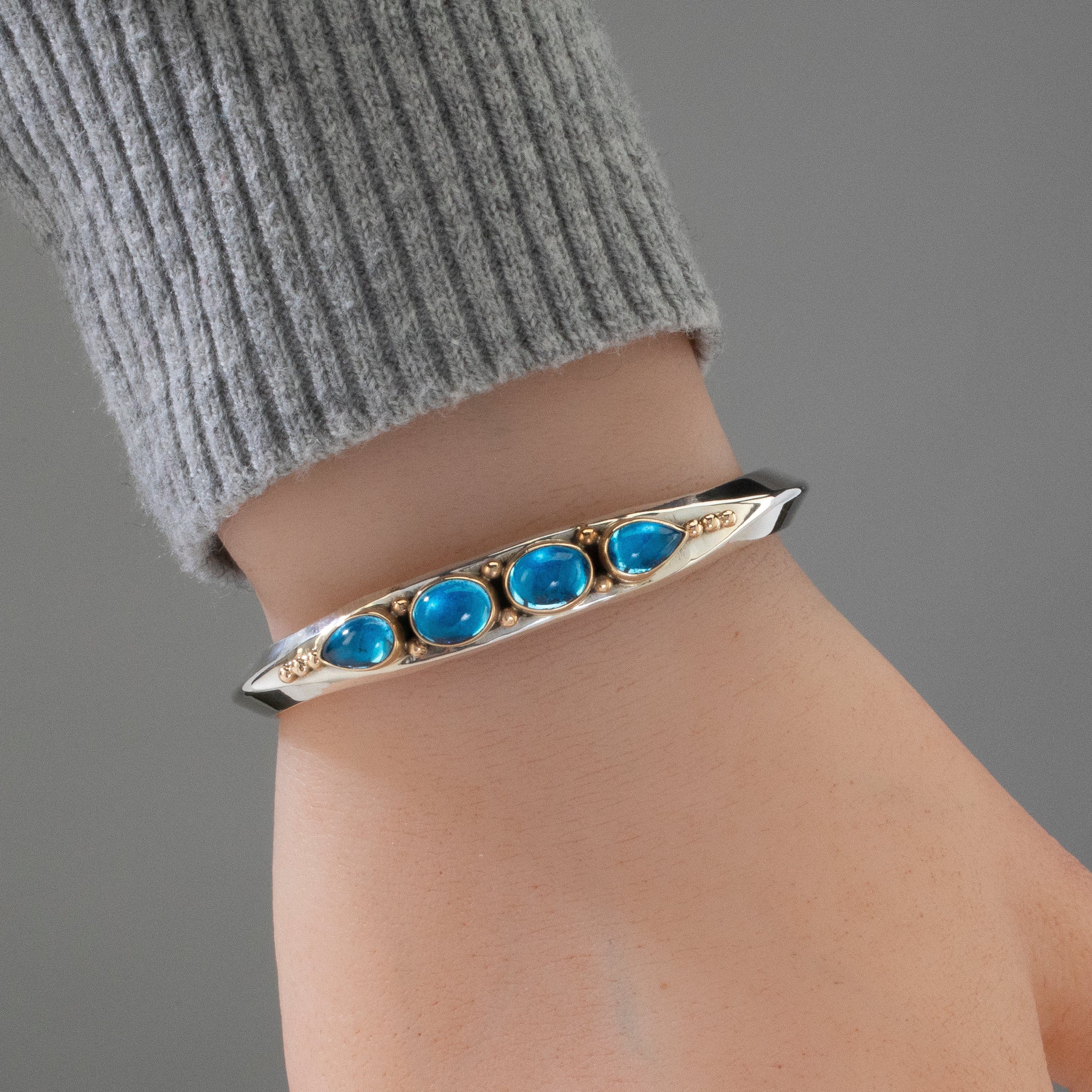 Kalifano Native American Jewelry Paul Livingston Swiss Blue Topaz & 14K Gold Navajo USA Native American Made 925 Sterling Silver Cuff NAB1600.014