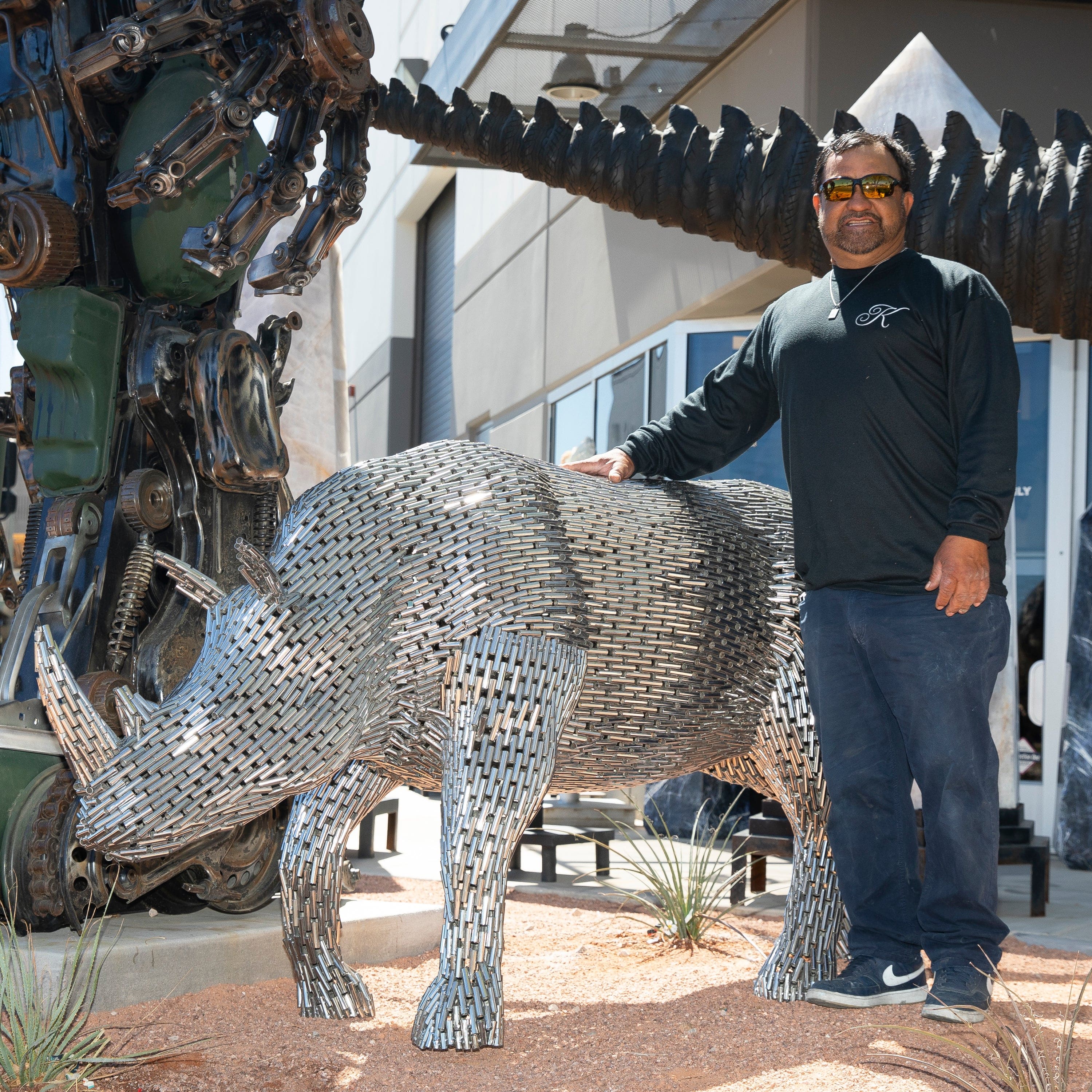 Kalifano Recycled Metal Art Stainless Steel Pipe Walking Rhino SSS-R216