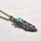 Aurora Borealis Turquoise Feather Steel Hearts Necklace